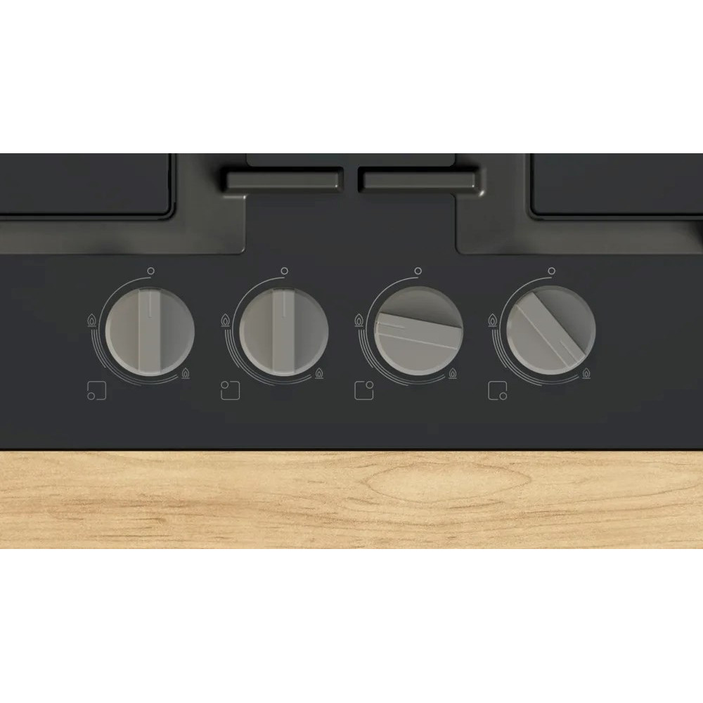 Zbliżenie na płytę grzewczą z czterema pokrętłami i drewnianym panelem. Pokrętła są szare, a płyta czarna.