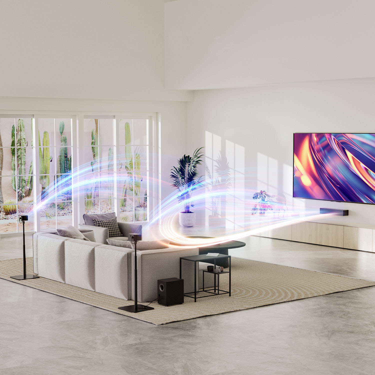 Salon z szarą sofą, telewizorem i głośnikami. Smugi światła emanują z telewizora. Kaktusy widoczne przez okno.