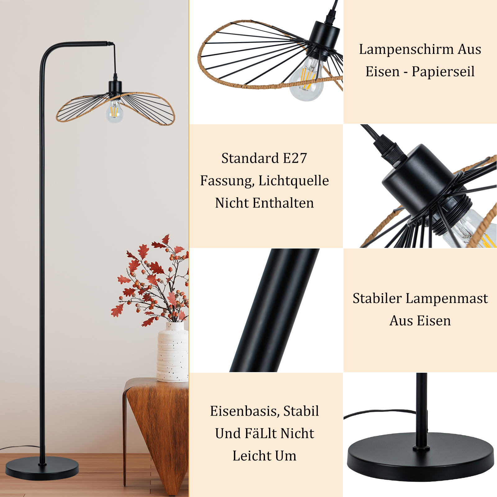 Una lampada da terra nera con paralume in corda di carta, lampadina e un vaso con foglie rosse su un tavolo di legno.