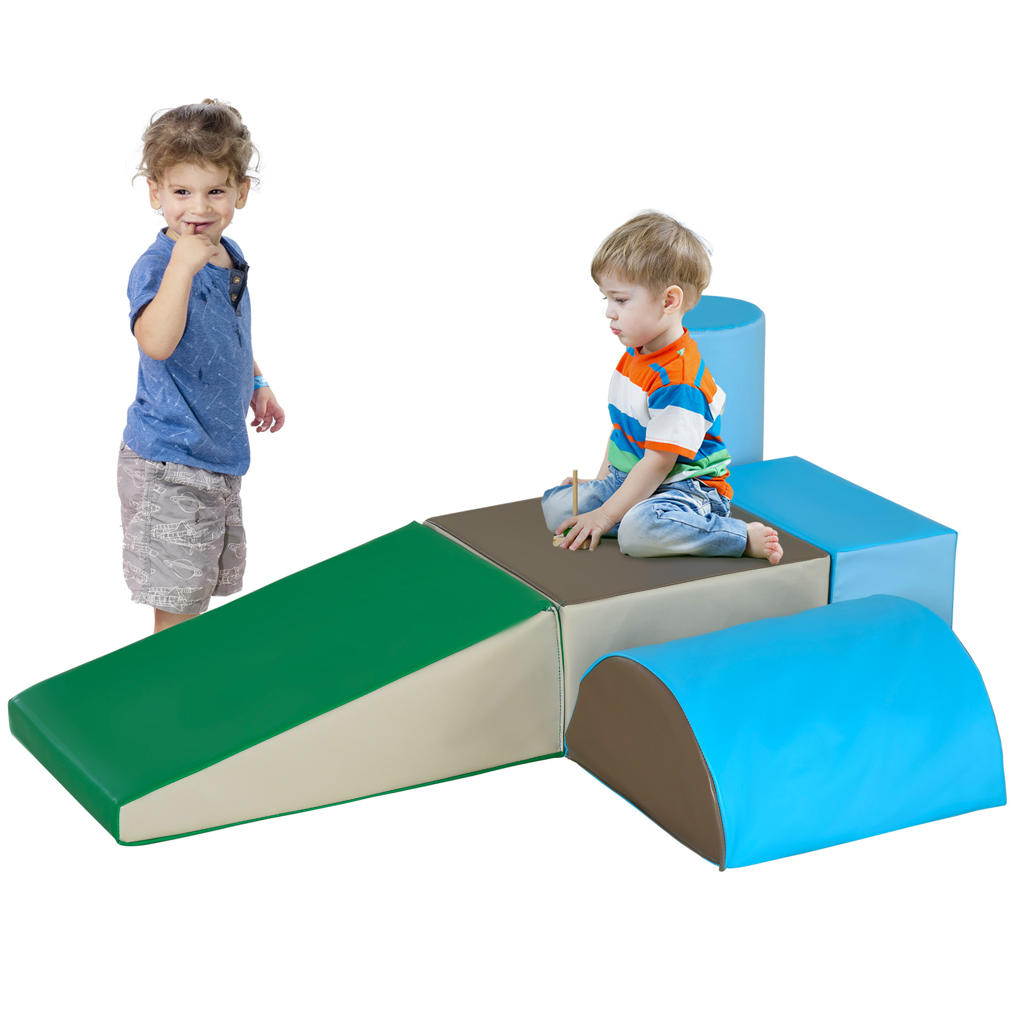 Due bambini giocano su blocchi di schiuma colorati. Uno si indica la bocca; l'altro è seduto con un giocattolo.