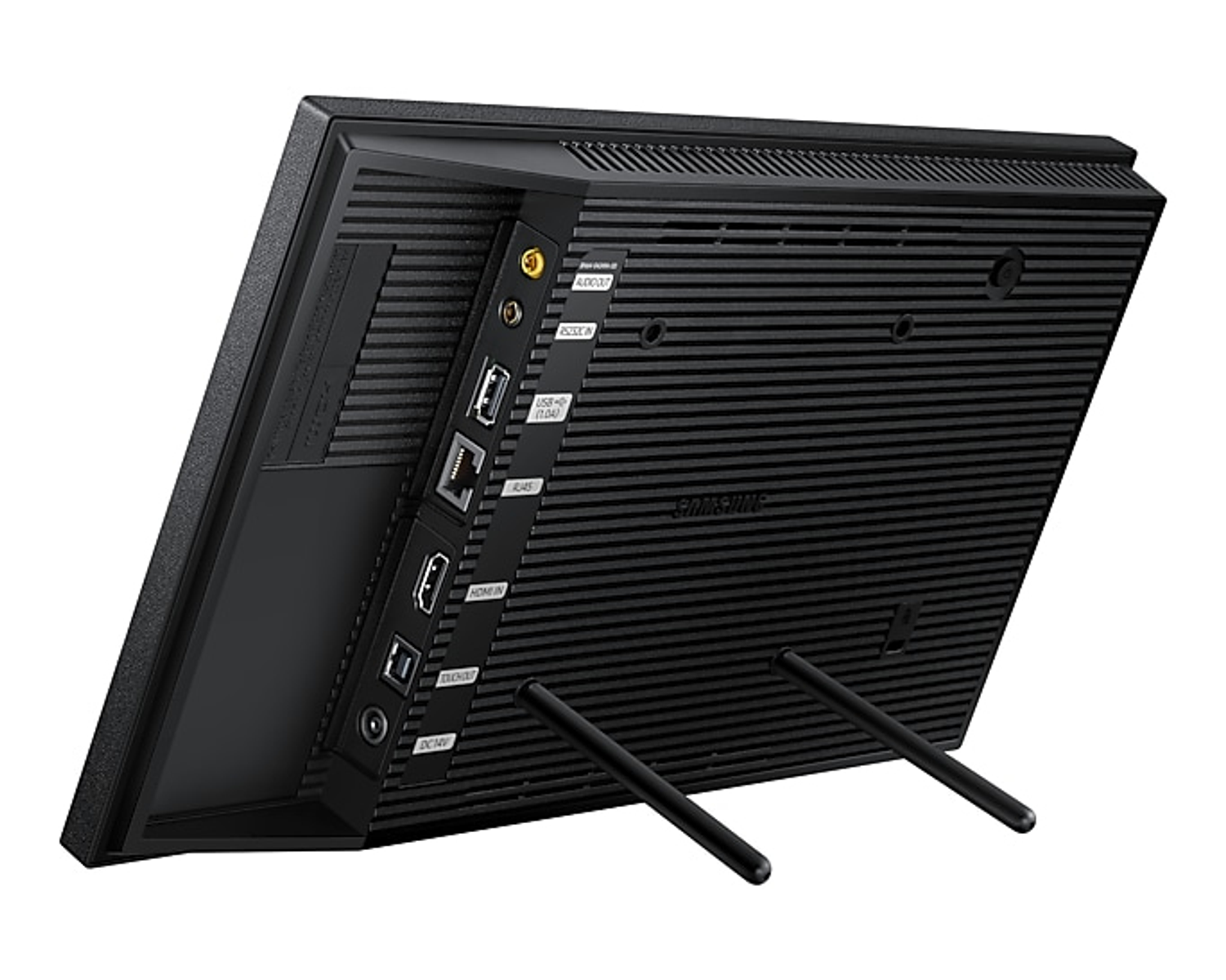 Vista posteriore di un monitor Samsung nero con porte. Ha un supporto, un retro a coste e varie porte etichettate.