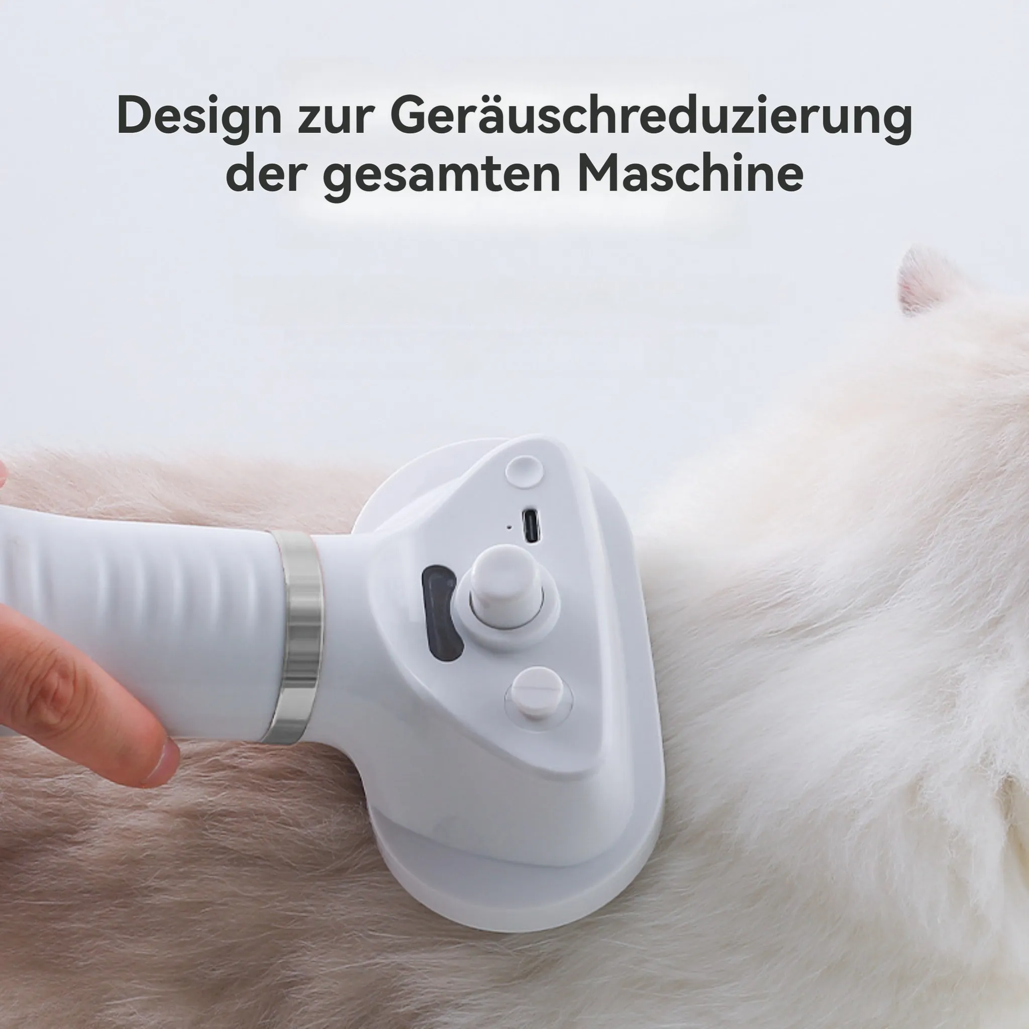 Ein weißes Pflegegerät wird an einer flauschigen Katze verwendet. Der Text oben lautet 'Design zur Geräuschreduzierung der gesamten Maschine'.