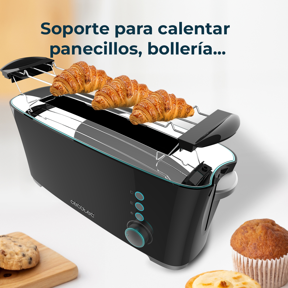 Un tostapane nero con croissant sopra. Un biscotto, un muffin e pasticcini sullo sfondo. Pubblicità del prodotto.