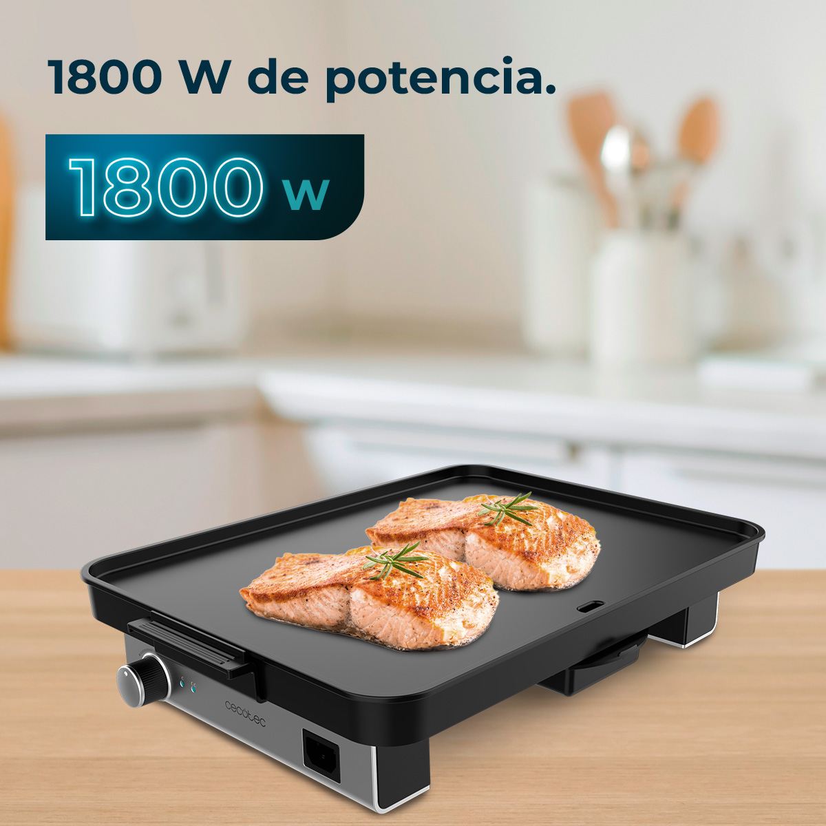 Electric grill with two salmon fillets. The grill is black on a wooden table. Text says 1800W of power.