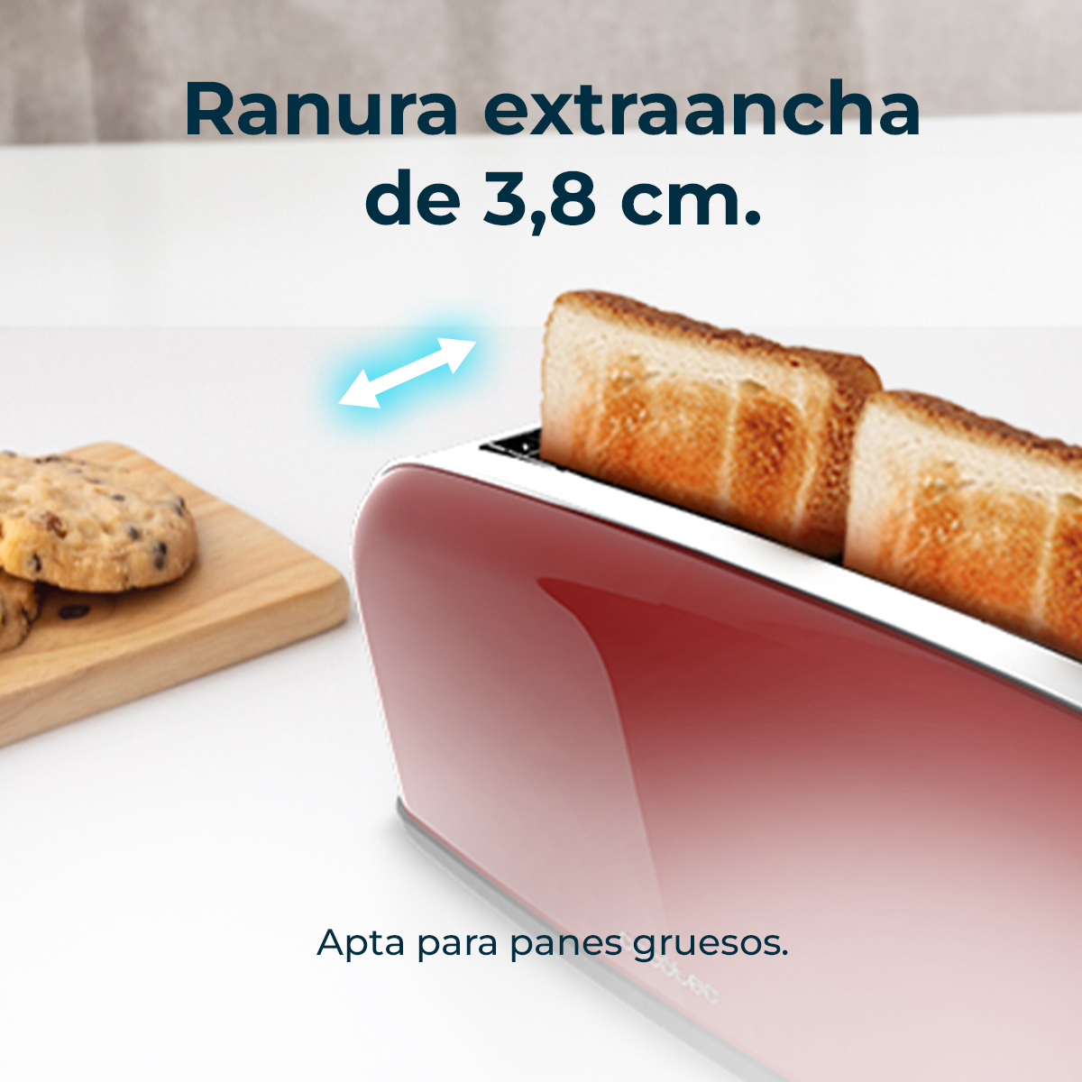 Un tostapane rosso con due fette di pane tostato. Biscotti su un tagliere di legno. Testo: 'fessura extra-large'.