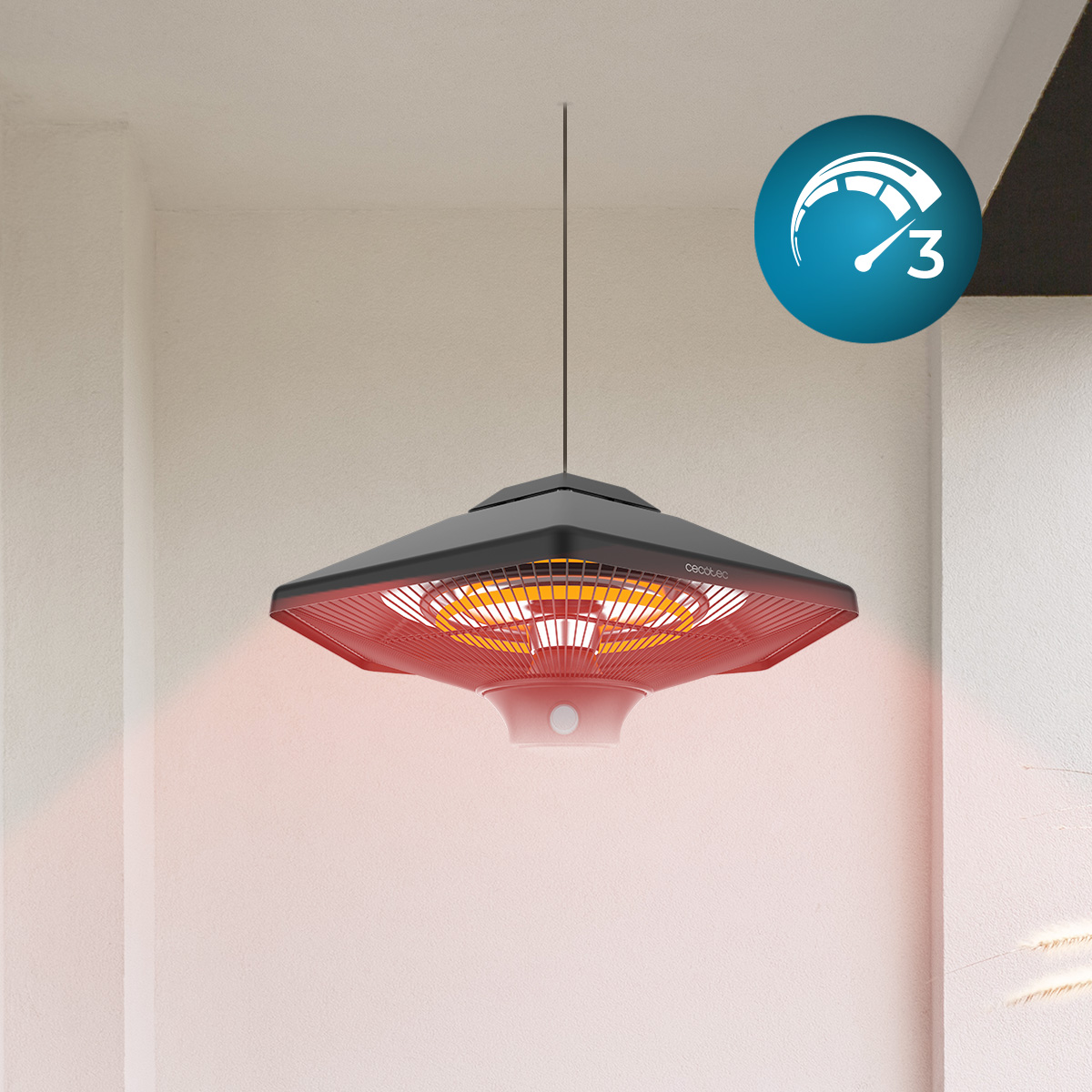 Sufitowy promiennik podczerwieni z czerwoną kratką i czarnym wierzchem jest zawieszony. Wskaźnik pokazuje ustawienie 3.