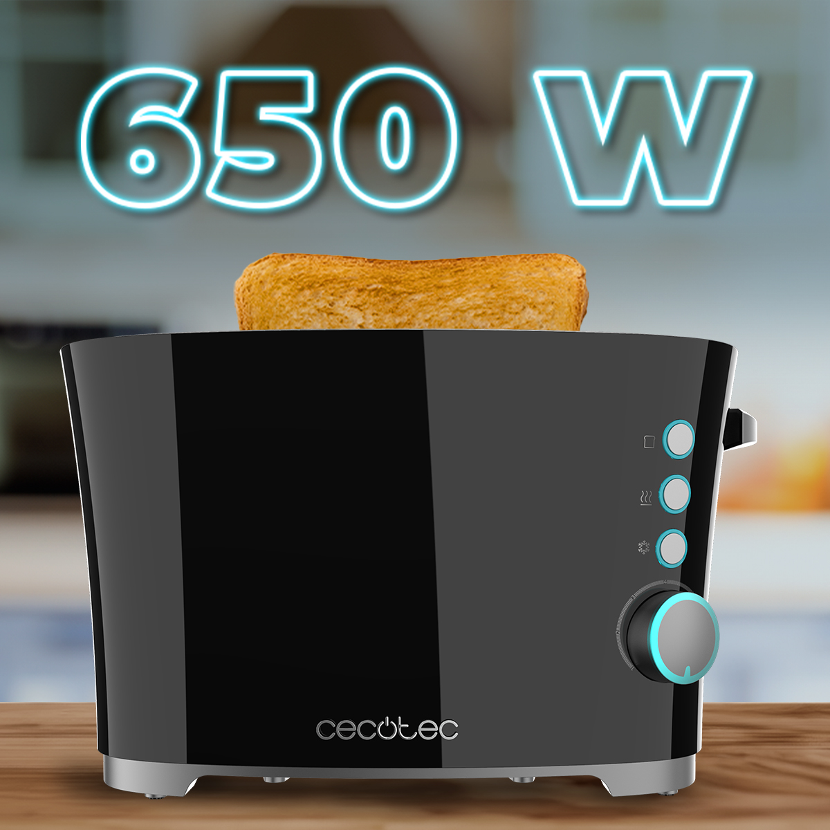 Czarny toster z wystającym kawałkiem tostów. Nad nim napis '650 W'. Marka to Cecotec.