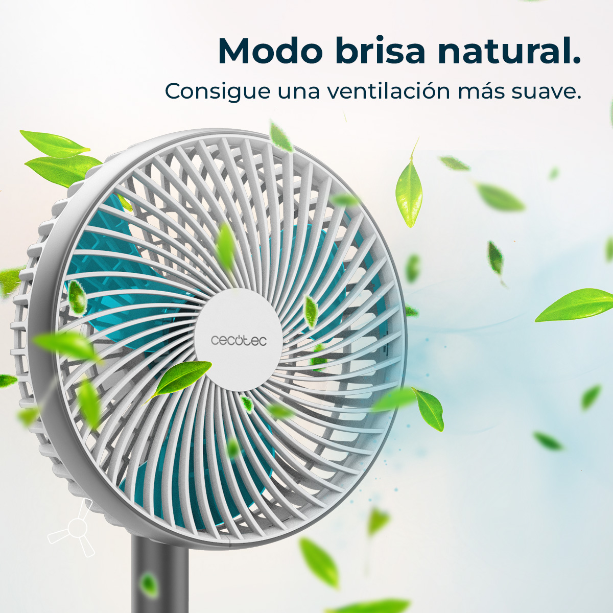 Un ventilador blanco y gris con aspas azules. Hojas verdes flotan alrededor, con texto en español, sugiriendo brisa natural.