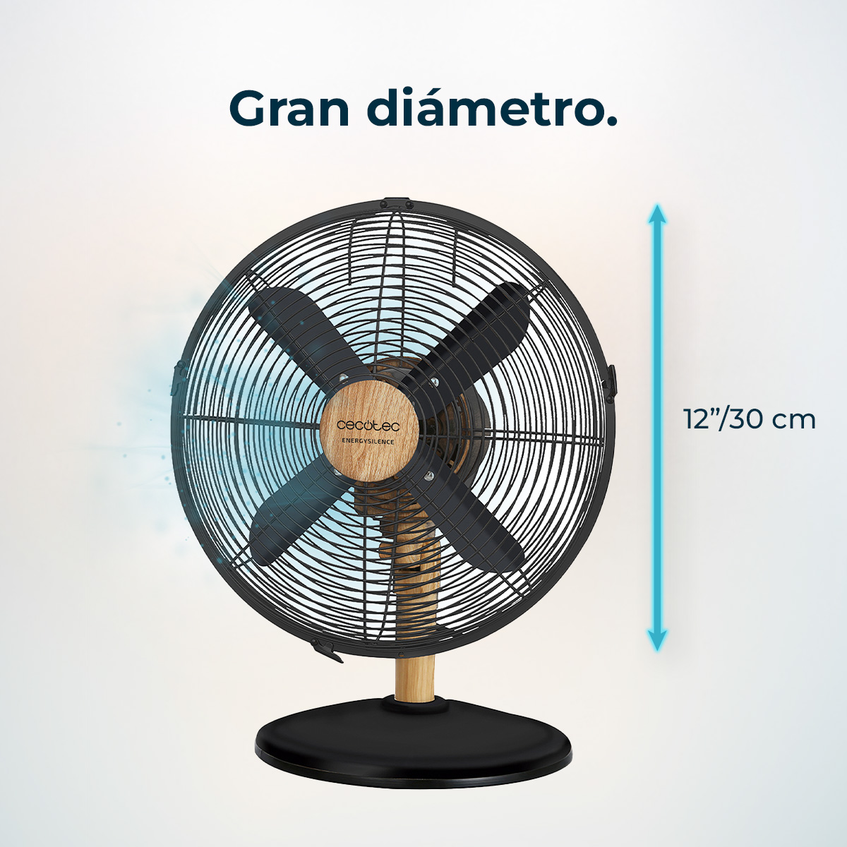 Czarny i drewniany wentylator z czterema łopatkami na jasnoniebieskim tle. Wentylator oznaczony jest jako 12"/30 cm.