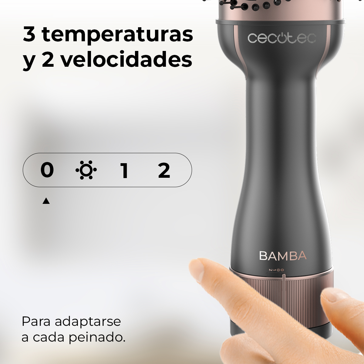 Un asciugacapelli nero e oro rosa. Ha impostazioni di temperatura e velocità. Una mano sta per regolare le impostazioni.