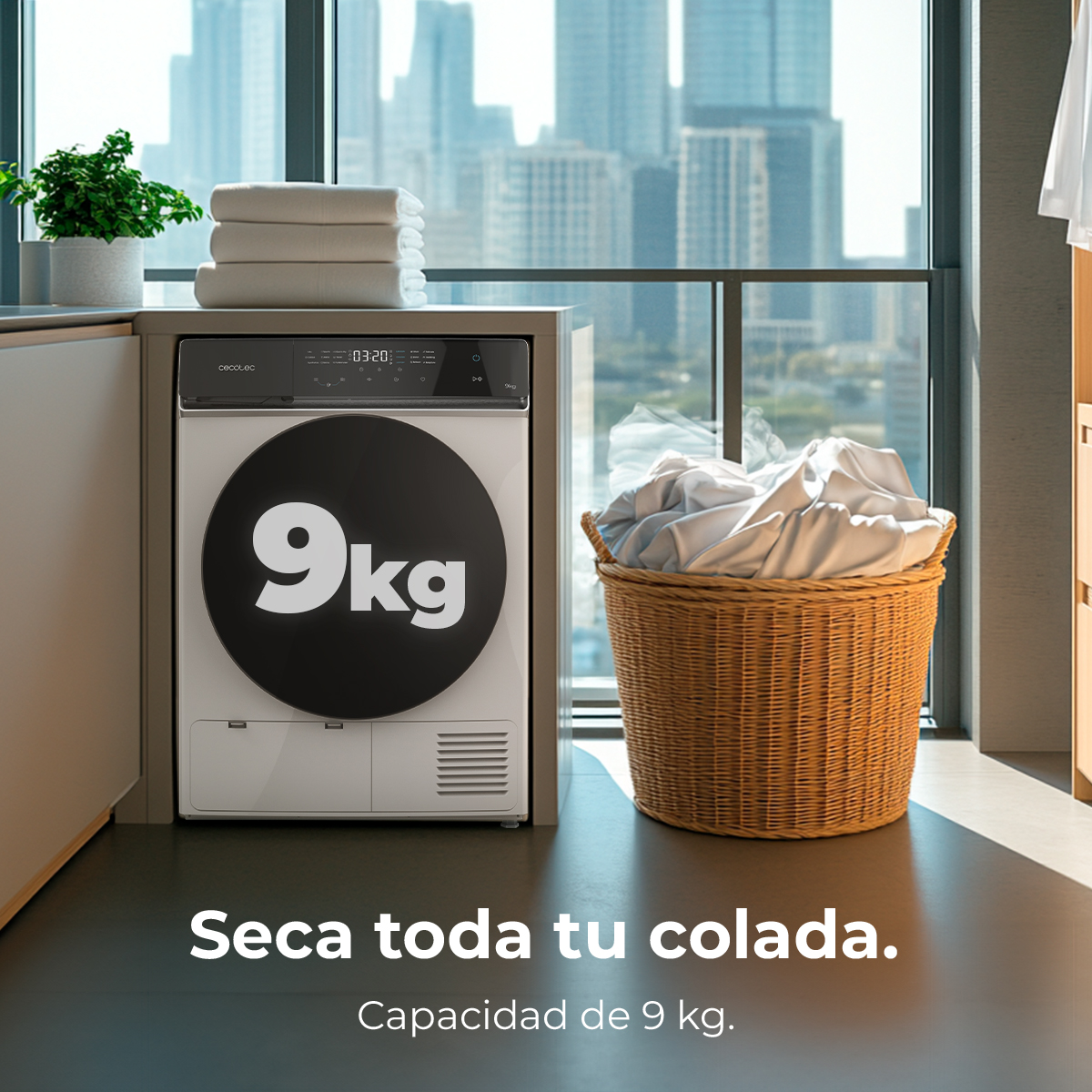 Suszarka o pojemności 9 kg w pralni. Obecny jest również kosz na pranie i stos ręczników.