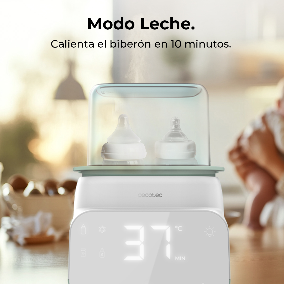 Ein Babyflaschenwärmer mit zwei Flaschen im Inneren. Das Display zeigt 37 Grad an. Text: 'Modo Leche. Calienta el biberón en 10 minutos.'