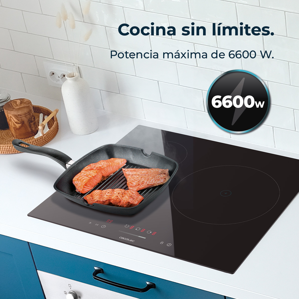 Una escena de cocina con una sartén en una estufa cocinando salmón. El texto dice 'Cocinar sin límites' y 'Potencia máxima 6600 W'.