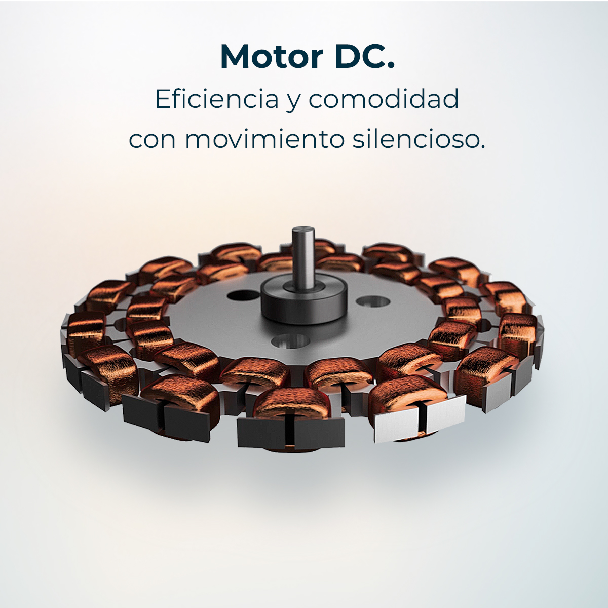 Zbliżenie wewnętrznych komponentów silnika prądu stałego. Miedziane cewki otaczają centralną szarą tarczę z cylindrycznym wałem.