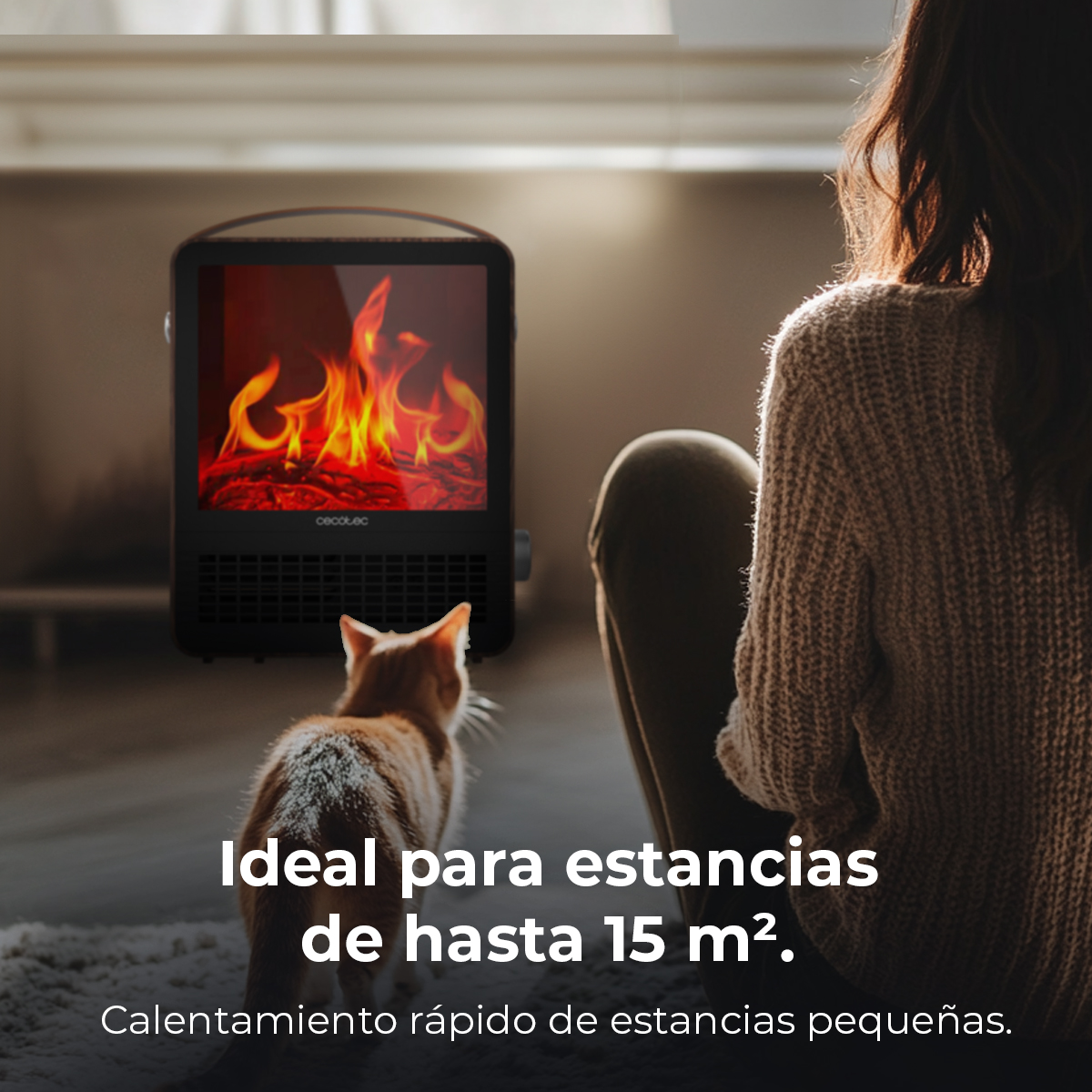 Una mujer se sienta junto a un calefactor negro con pantalla de fuego. Un gato naranja en primer plano. Texto: Ideal para espacios de hasta 15 m².