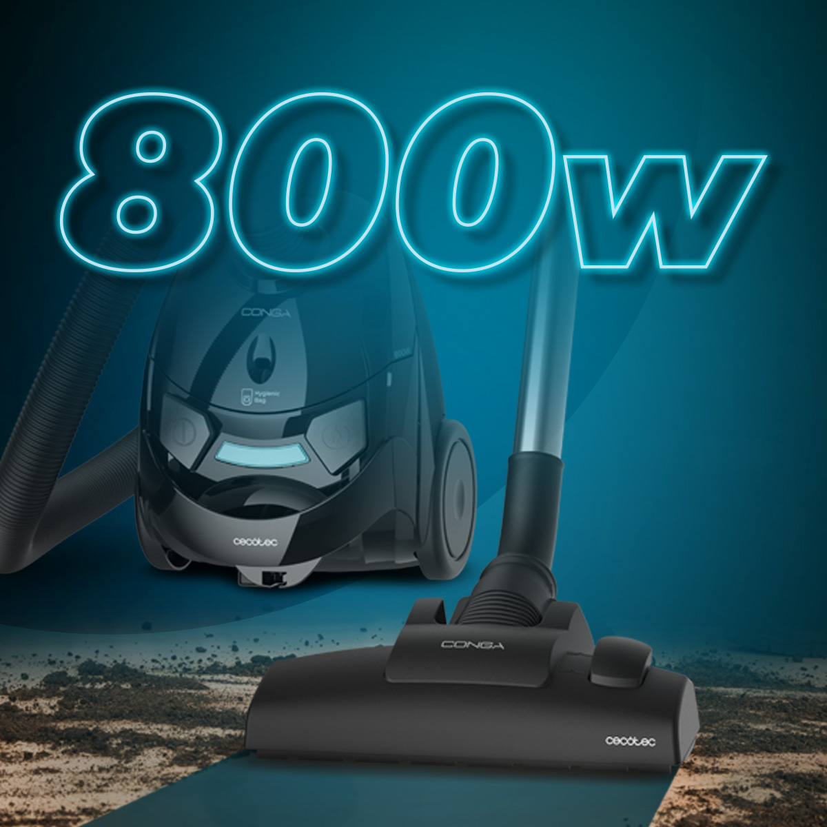 Una aspiradora Conga negra con texto 800W. La aspiradora está sobre una superficie azul, con suciedad en primer plano.