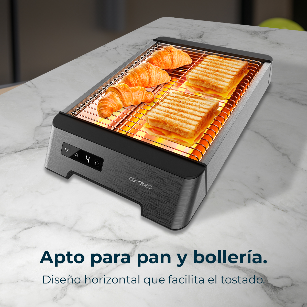 Un tostapane con croissant e panini sopra. Il tostapane è su una superficie di marmo. Testo: 'Adatto a pane e prodotti da forno.'
