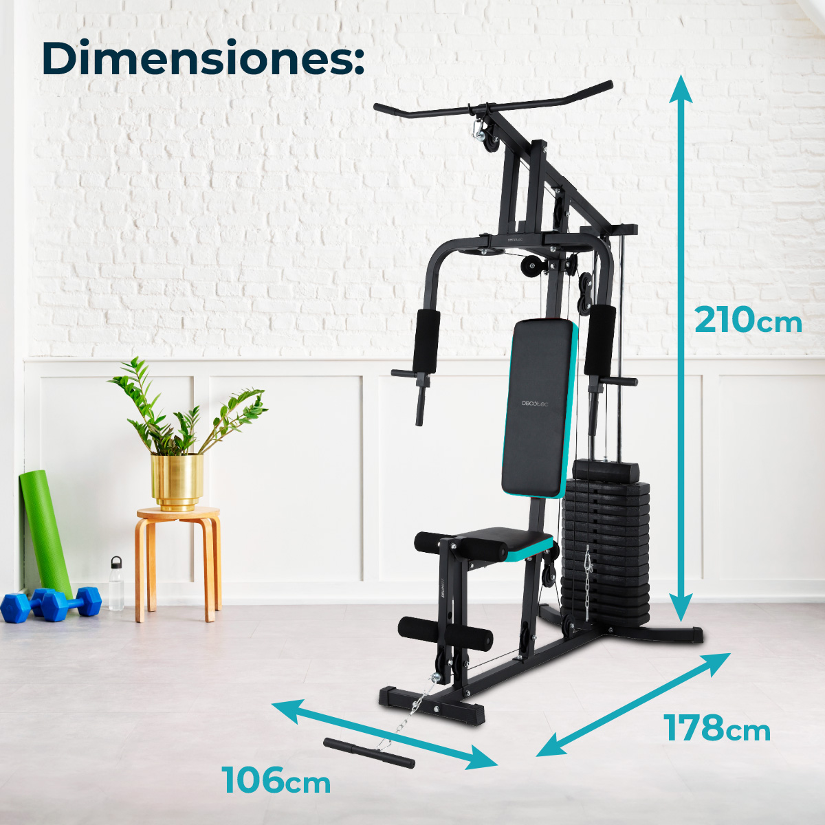 Una máquina de gimnasio negra con pesas. Dimensiones: 210 cm alto, 178 cm ancho y 106 cm profundo. Otros artículos de fitness en el fondo.