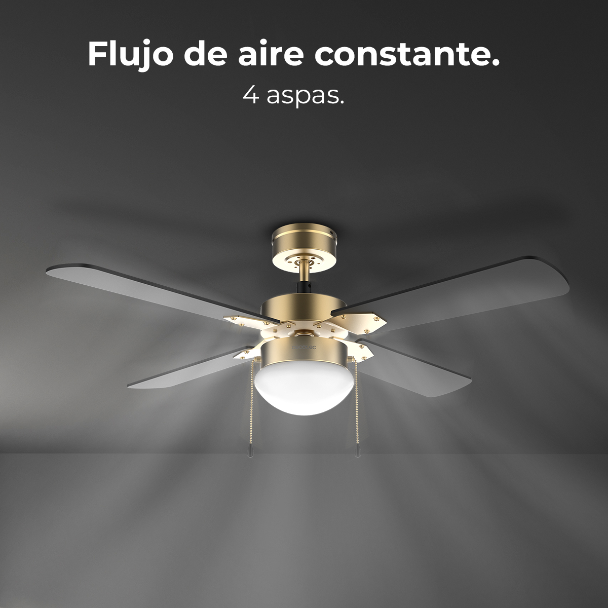 Ein Deckenventilator mit vier Flügeln und einer Leuchte. Der Ventilator ist gold und schwarz auf dunklem grauem Hintergrund. Spanischer Text oben.