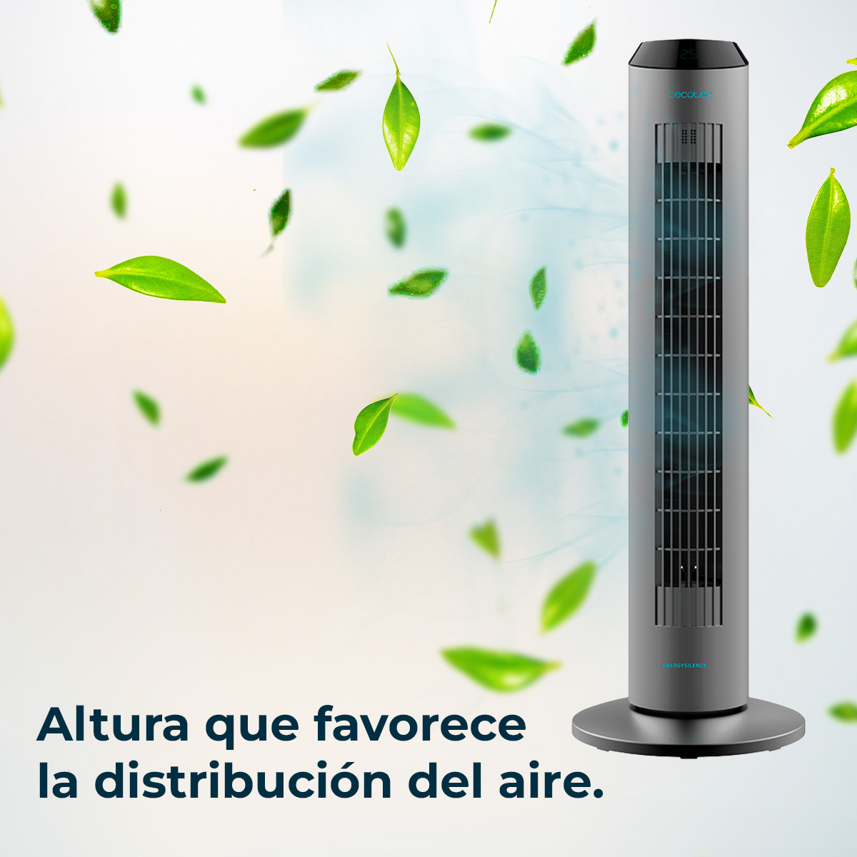 Szary wentylator wieżowy z unoszącymi się zielonymi liśćmi. Tekst na dole brzmi: 'Altura que favorece la distribución del aire.'