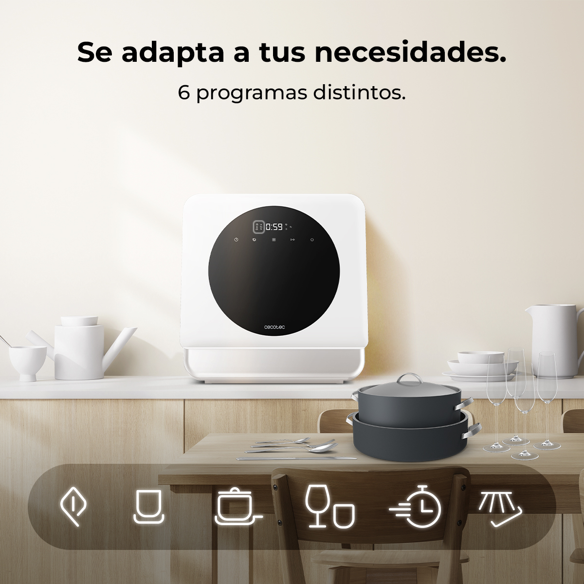 Un electrodoméstico blanco con una pantalla circular negra está sobre una encimera. Ollas, vasos y utensilios en una mesa de madera.