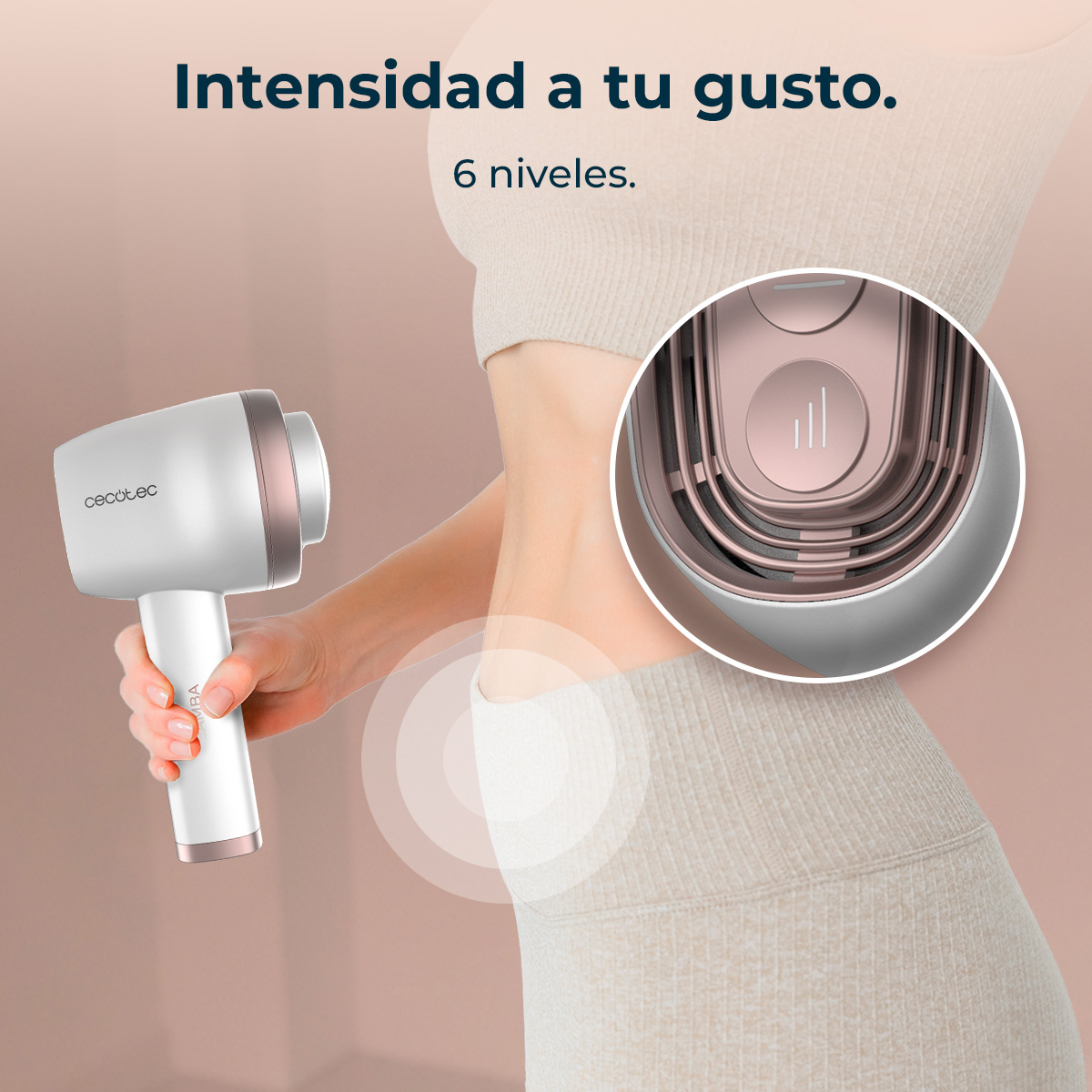 Una persona sostiene un dispositivo blanco y oro rosa cerca de su abdomen. Un primer plano muestra el panel de control del dispositivo.