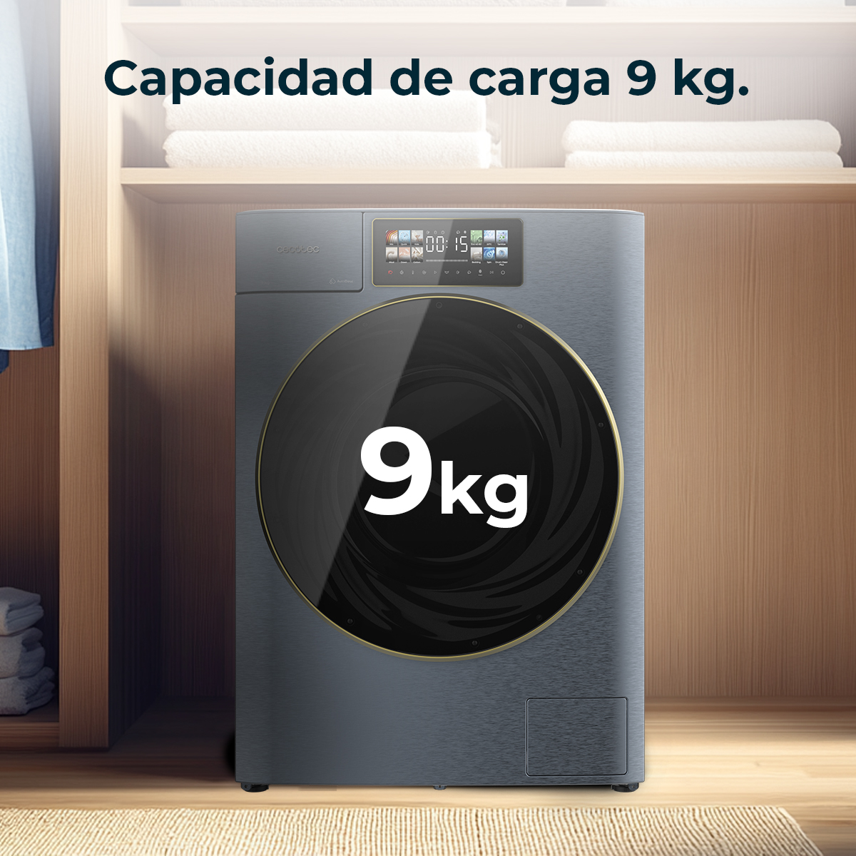 Una lavatrice grigio scuro con un'ampia porta nera. Mostra '9 kg' in bianco. Sopra c'è una mensola con asciugamani piegati.