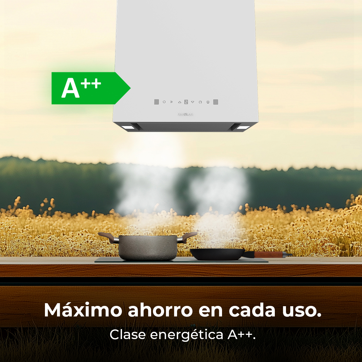 Una campana extractora blanca sobre una estufa con ollas. Una etiqueta verde A++ de eficiencia energética está a la izquierda. El fondo es la naturaleza.