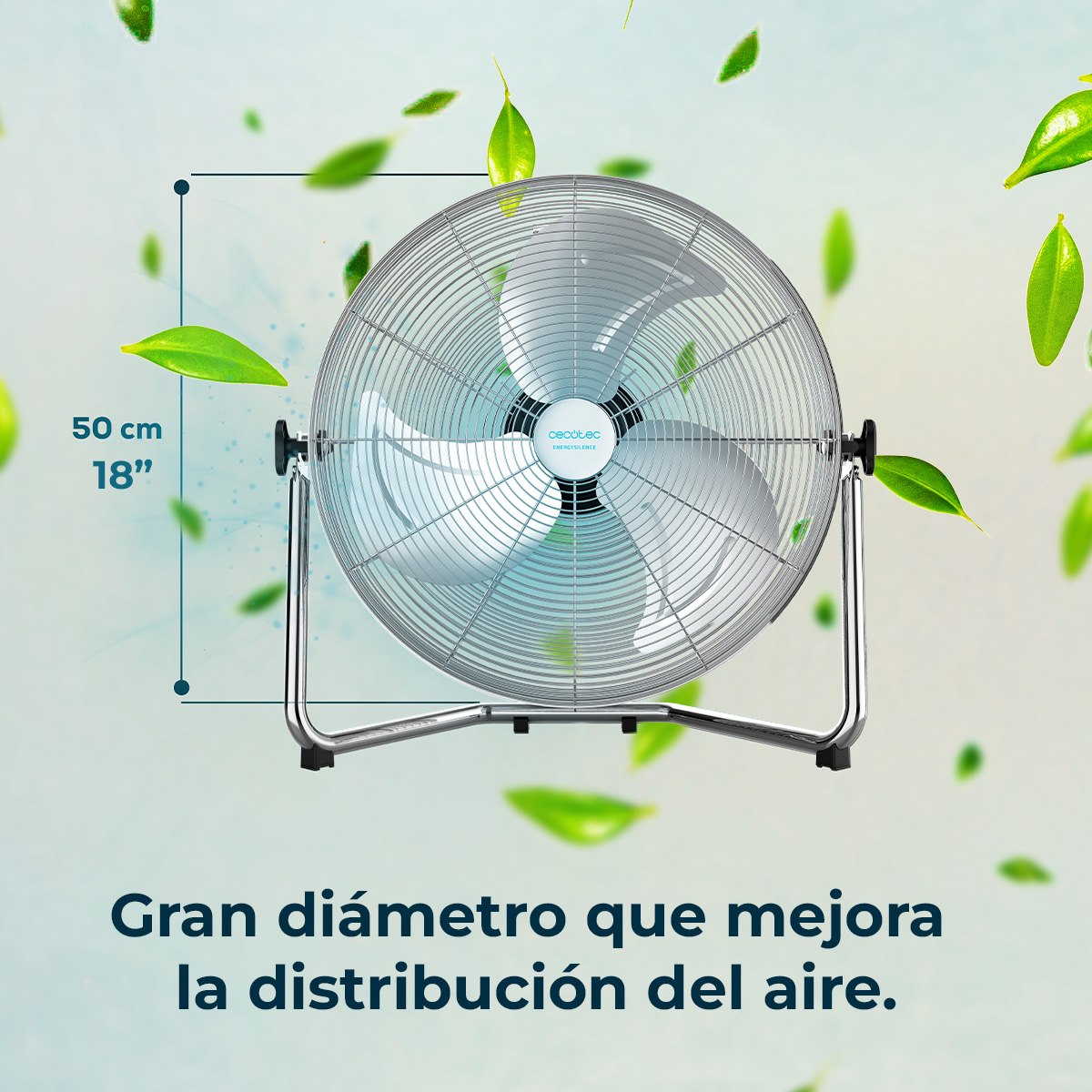 Metalowy wentylator z trzema łopatkami i osłoną. Zielone liście unoszą się wokół. Tekst: Duża średnica poprawia dystrybucję powietrza.
