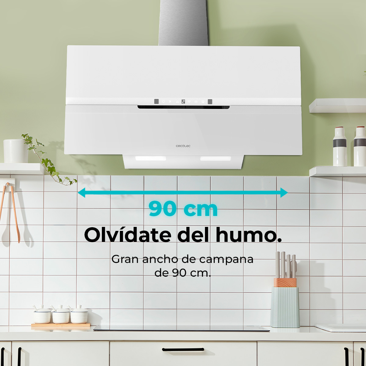 Campana extractora blanca sobre pared de azulejos blancos, con medida de 90 cm y texto 'Olvídate del humo', contexto de cocina.