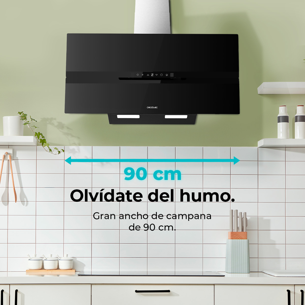 Una campana extractora negra sobre un salpicadero de azulejos blancos. El texto dice "90 cm" y "Olvídate del humo".