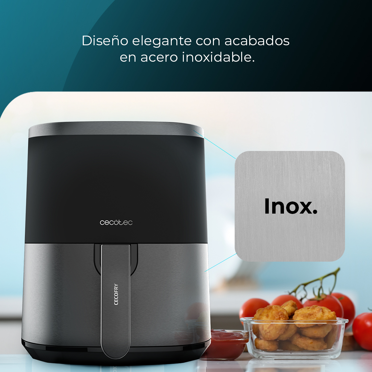 Una freidora de aire con acabado de acero inoxidable. Nuggets, tomates y ketchup en el fondo.