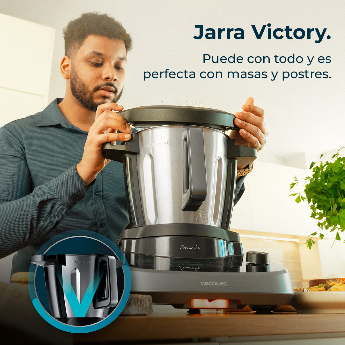 Un hombre ensamblando un electrodoméstico de cocina. El aparato es plateado y negro, con pantalla digital. El texto dice 'Victory' y 'Mambo'.