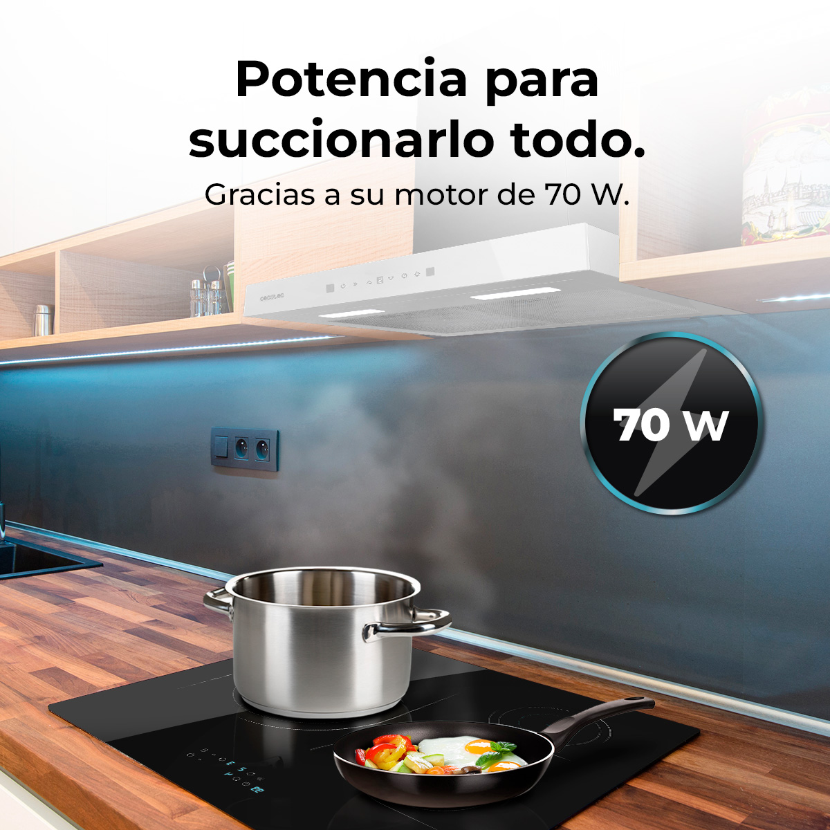 Escena de cocina con olla, sartén con comida y campana extractora. Texto: 'Potencia para succionarlo todo'.