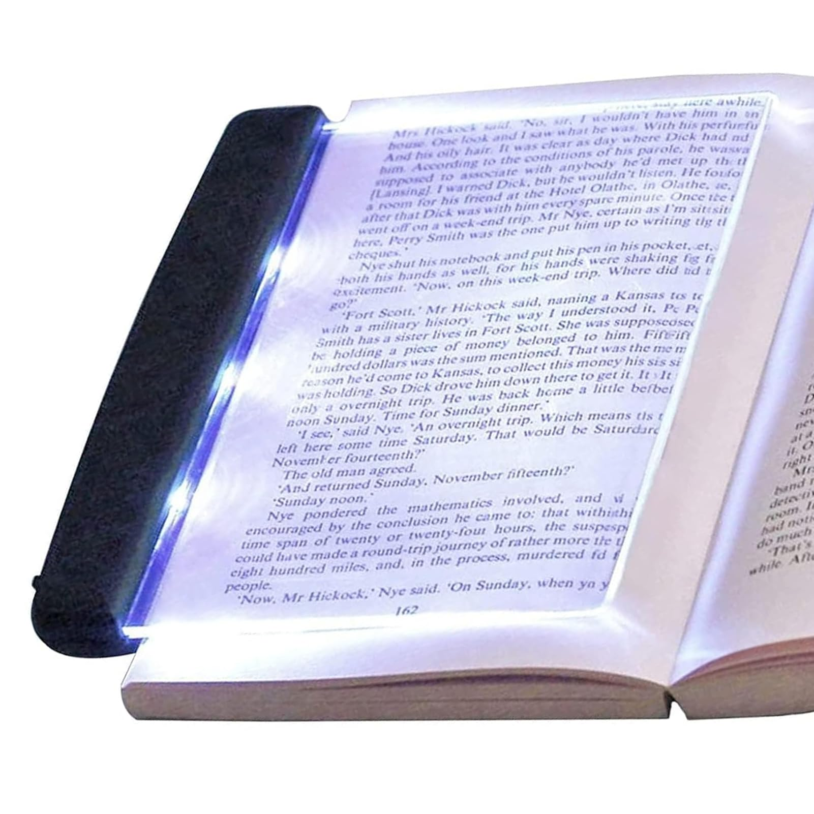 Ein Buch, das von einer Leselampe beleuchtet wird. Text ist auf den Seiten sichtbar. Das Licht ist schwarz und rechteckig.