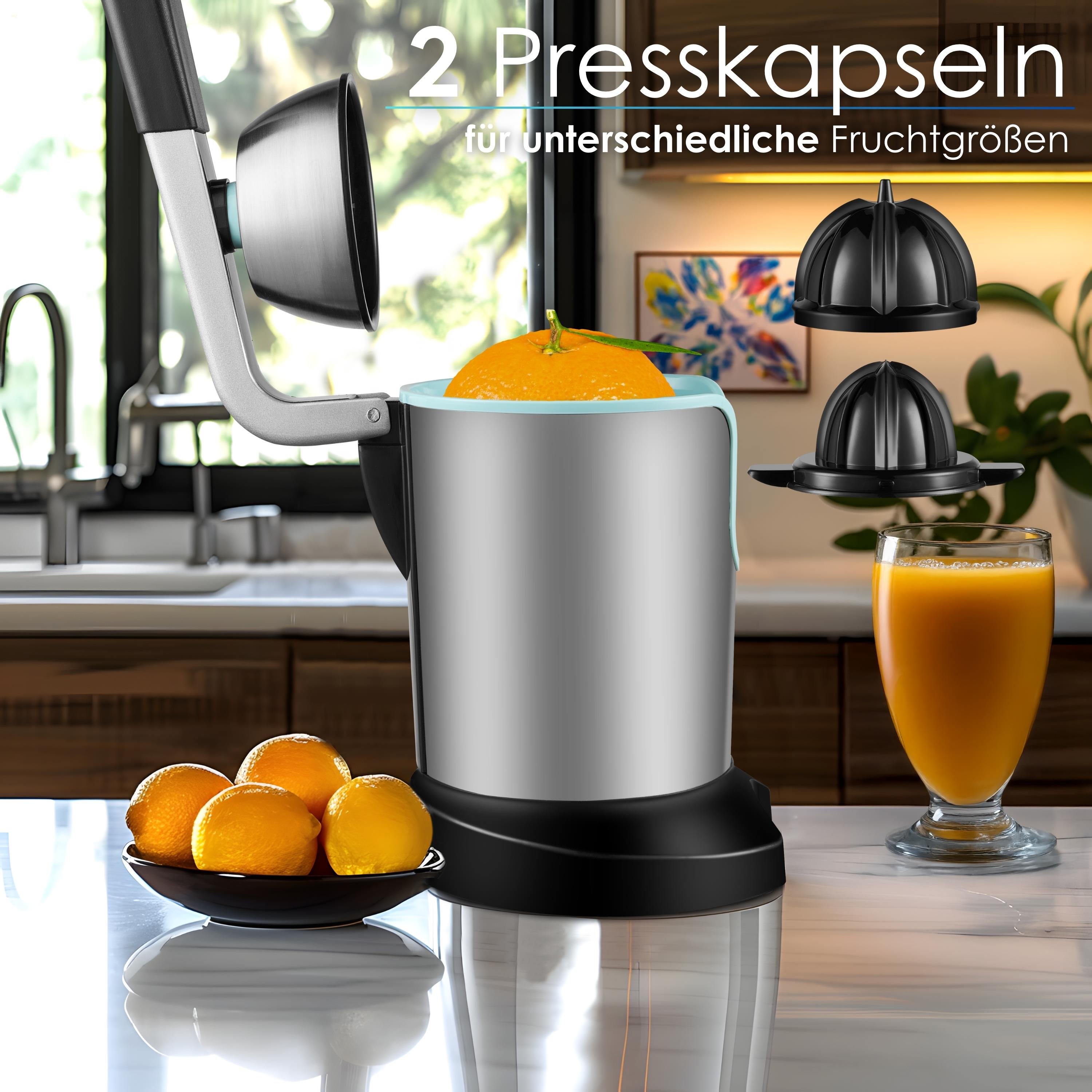 Zitruspresse mit Orange, Orangen, Saftglas und zwei Pressköpfen. Küchenhintergrund.