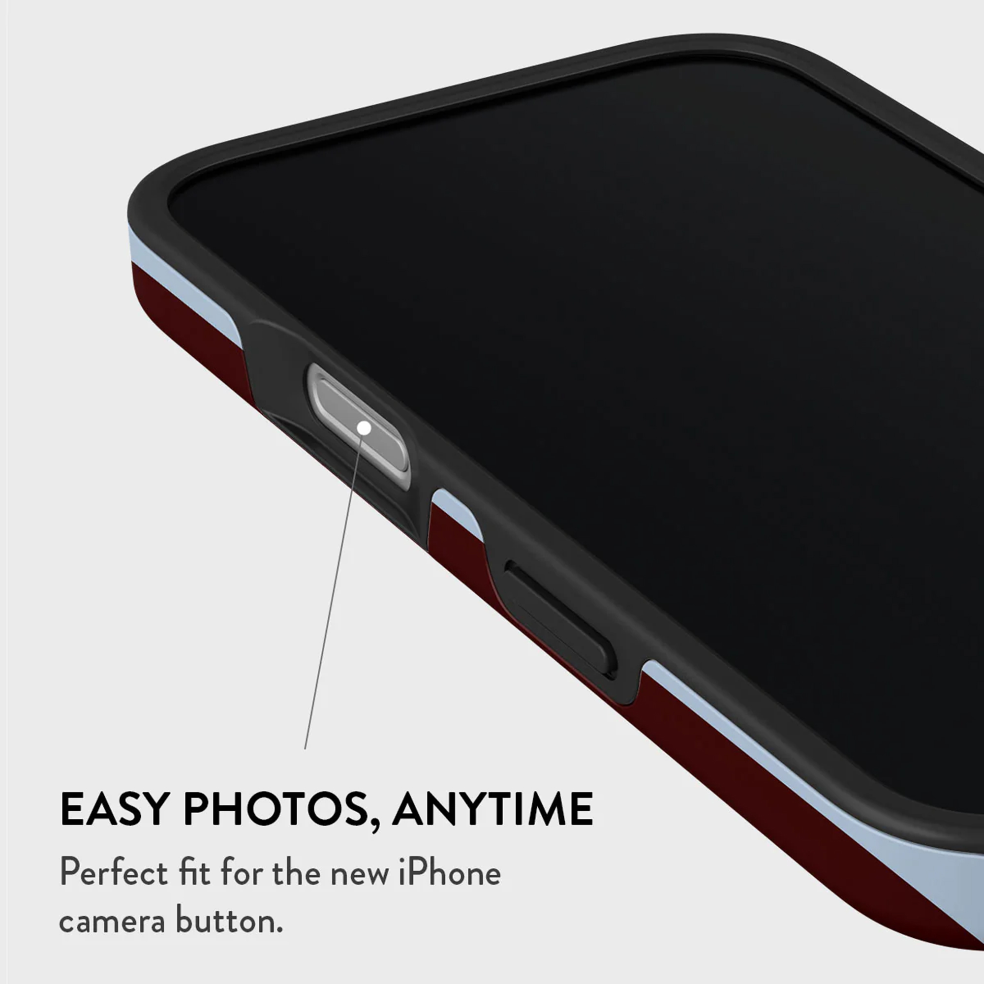 Gros plan d'un smartphone noir avec un étui rouge et blanc, montrant les boutons latéraux.