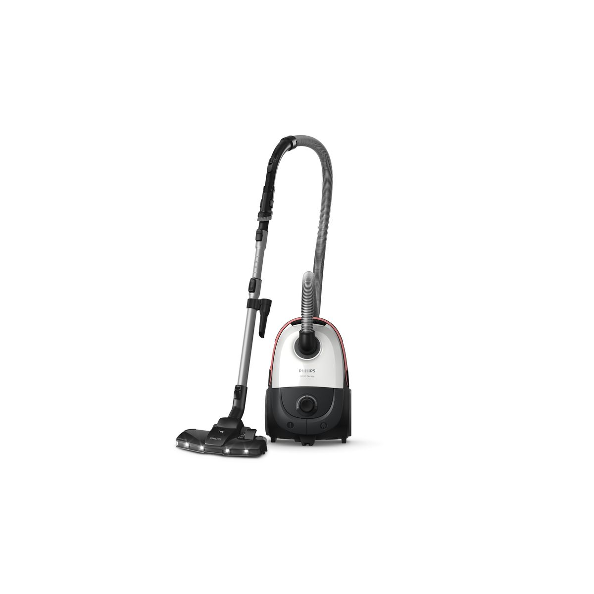 Odkurzacz Philips na białym tle. Jest czarny, biały i czerwony. Wąż wygina się do góry. Szczotka jest po lewej stronie.