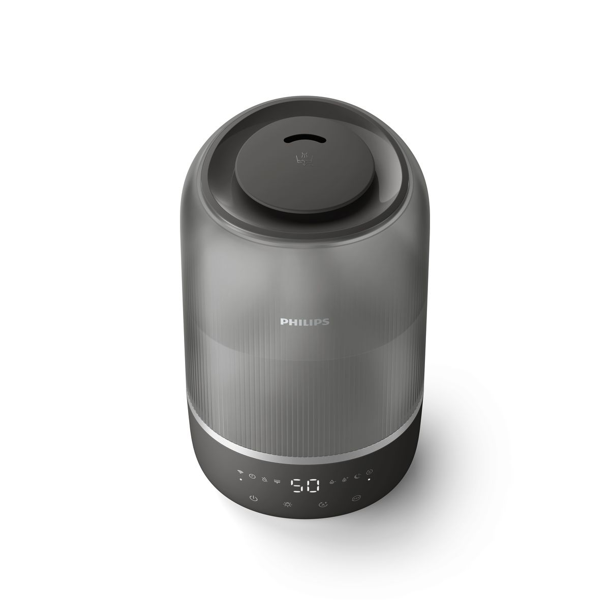 Szary nawilżacz Philips. Ma okrągły kształt, wyświetlacz pokazujący 50 i górny odpowietrznik. Stoi na białym tle.