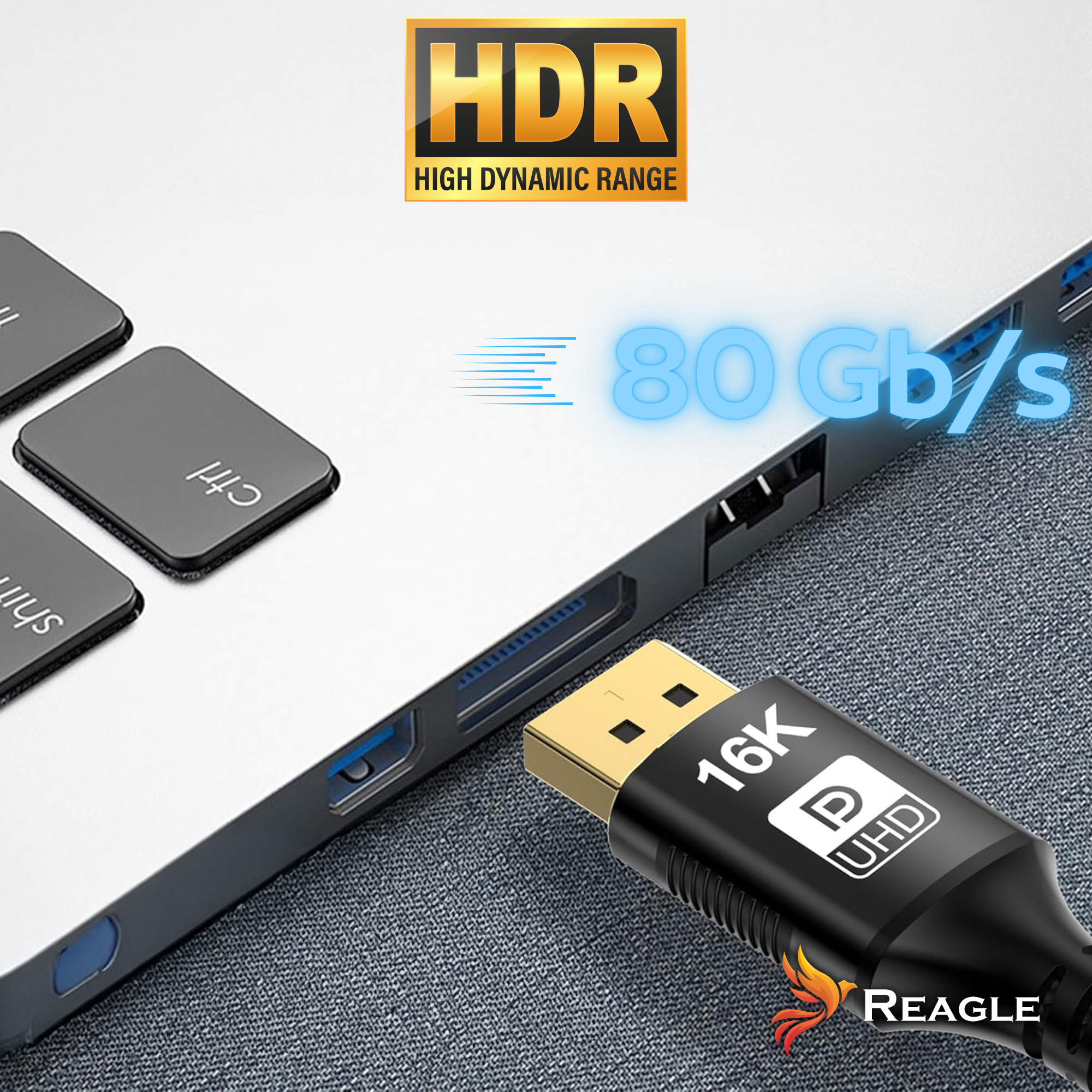 Laptop z czarnym kablem. Kabel ma złoty konektor i tekst '16K UHD'. Logo HDR jest w tle.