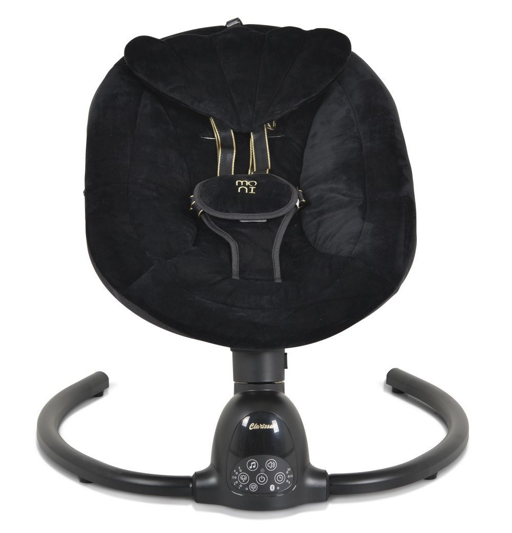 Mecedora negra para bebés con asiento y base. Acentos dorados y panel de control visibles. El asiento tiene reposacabezas. La base es curva.