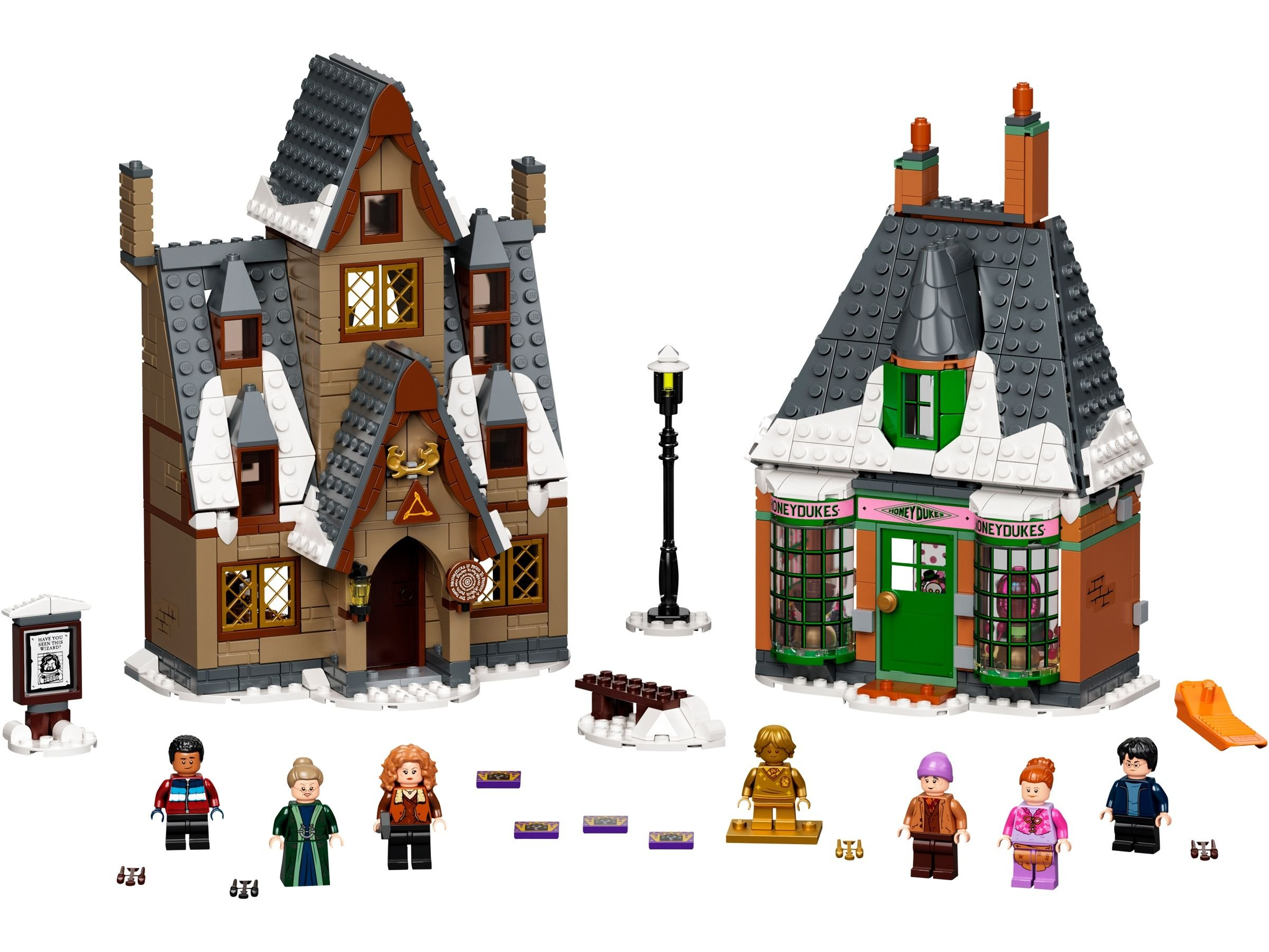 Lego-Set mit zwei Gebäuden, Figuren und Zubehör. Ein Gebäude ist braun, das andere orange. Es gibt auch Minifiguren.