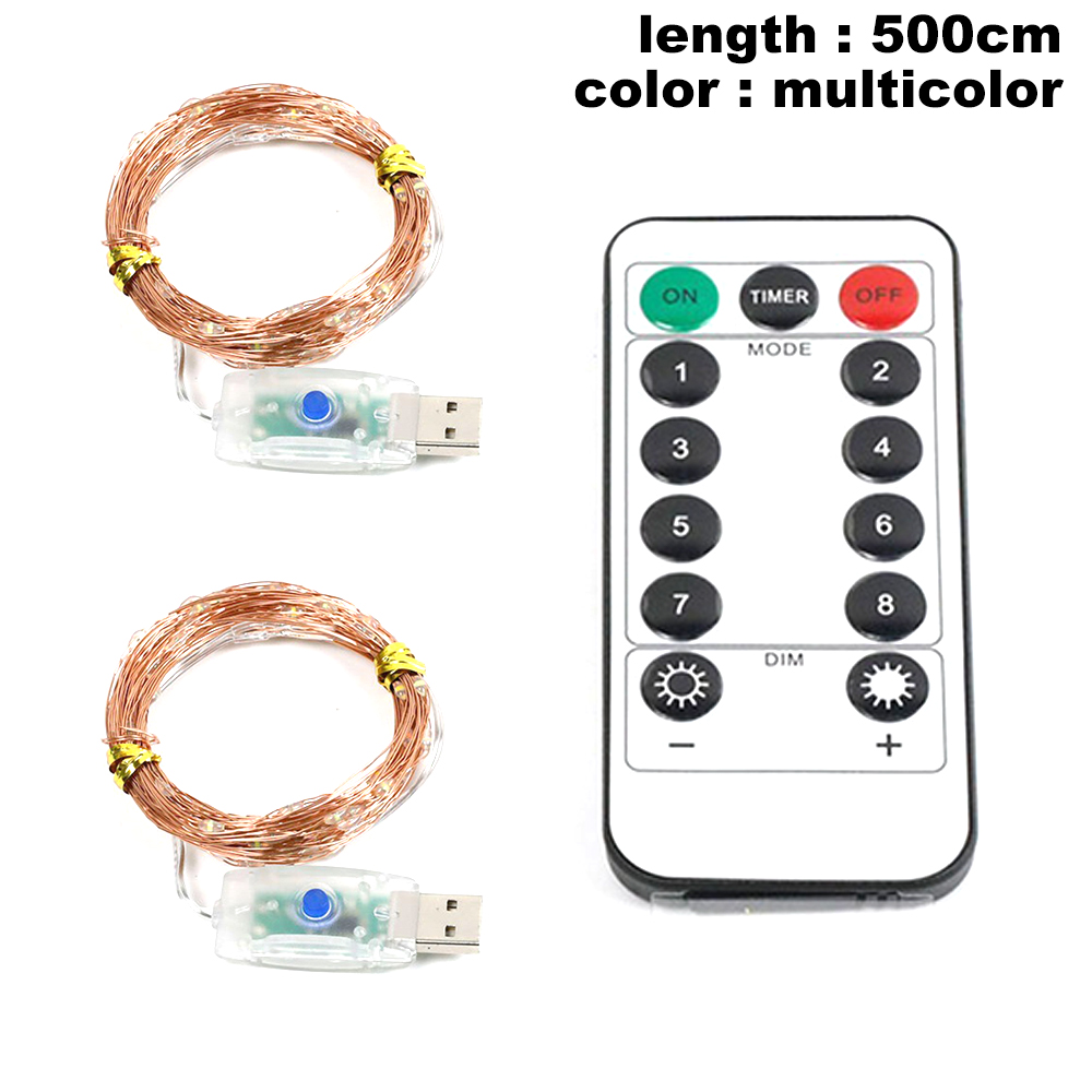 Zwei Spulen Kupferdrahtlichter, USB-Anschlüsse und eine Fernbedienung mit Tasten ON, OFF und Nummern.