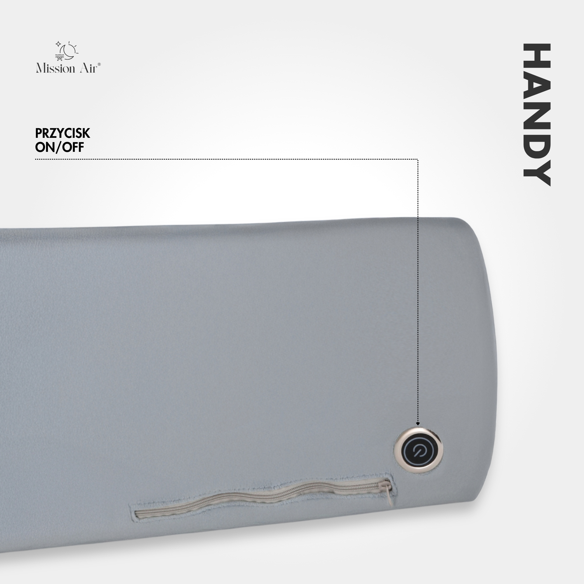 Szara poduszka z przyciskiem włącz/wyłącz i zamkiem błyskawicznym. Słowo 'HANDY' wydrukowane pionowo po prawej stronie.
