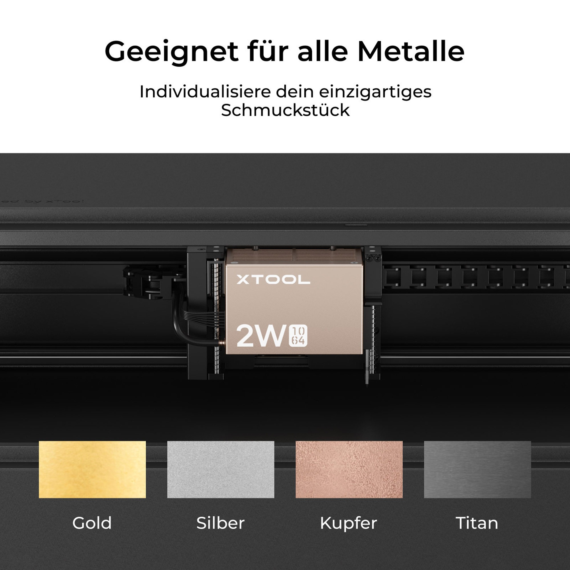 Das Bild zeigt eine Metallgraviermaschine mit Farbmustern aus Gold, Silber, Kupfer und Titan.