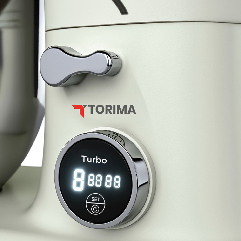 Krem renkli bir mutfak aletinin, krom tutacağı ve "Turbo" ve sayılar gösteren dijital ekranının yakın çekimi.