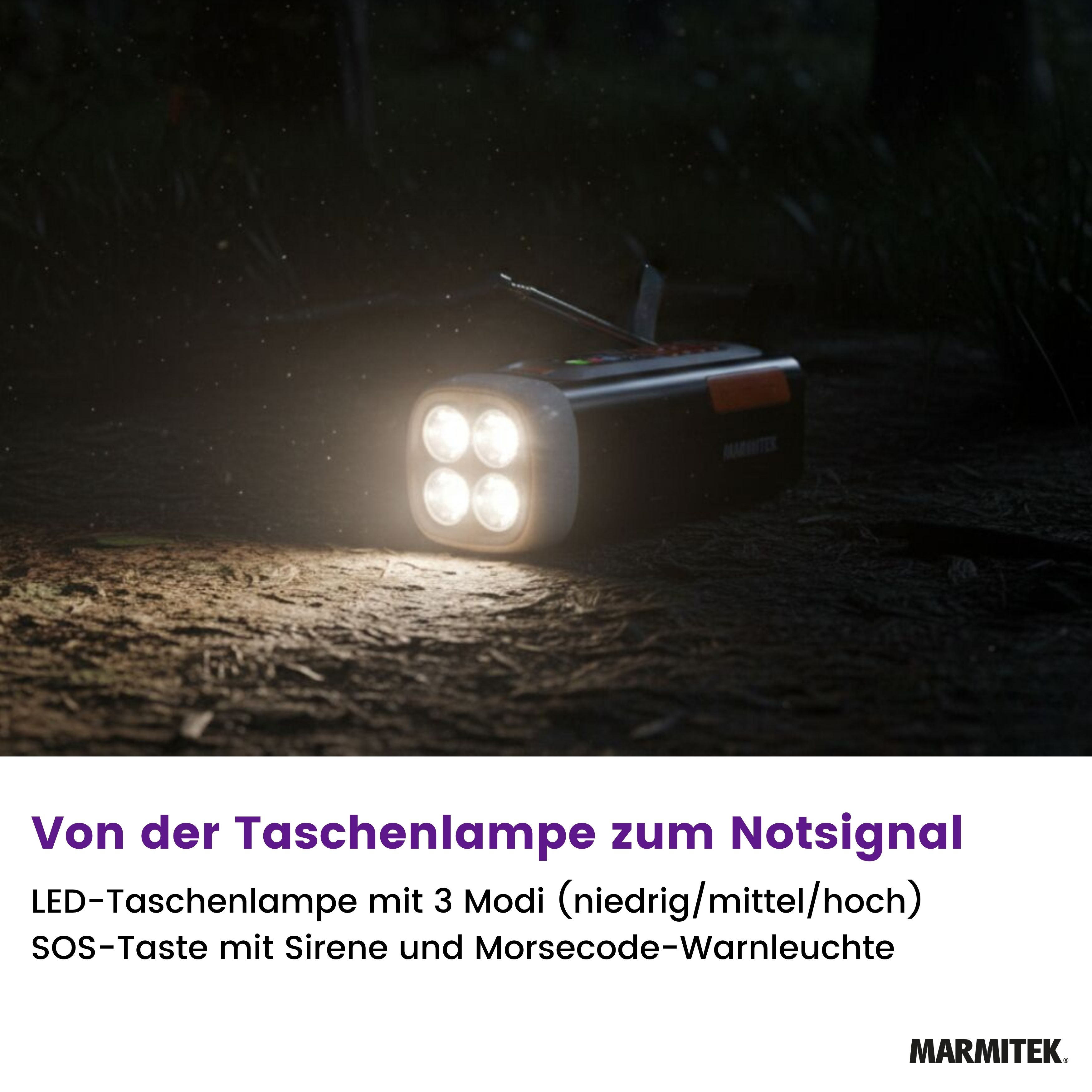 A flashlight emitting bright light on a forest floor. It has four LEDs, an antenna, and is black and orange.