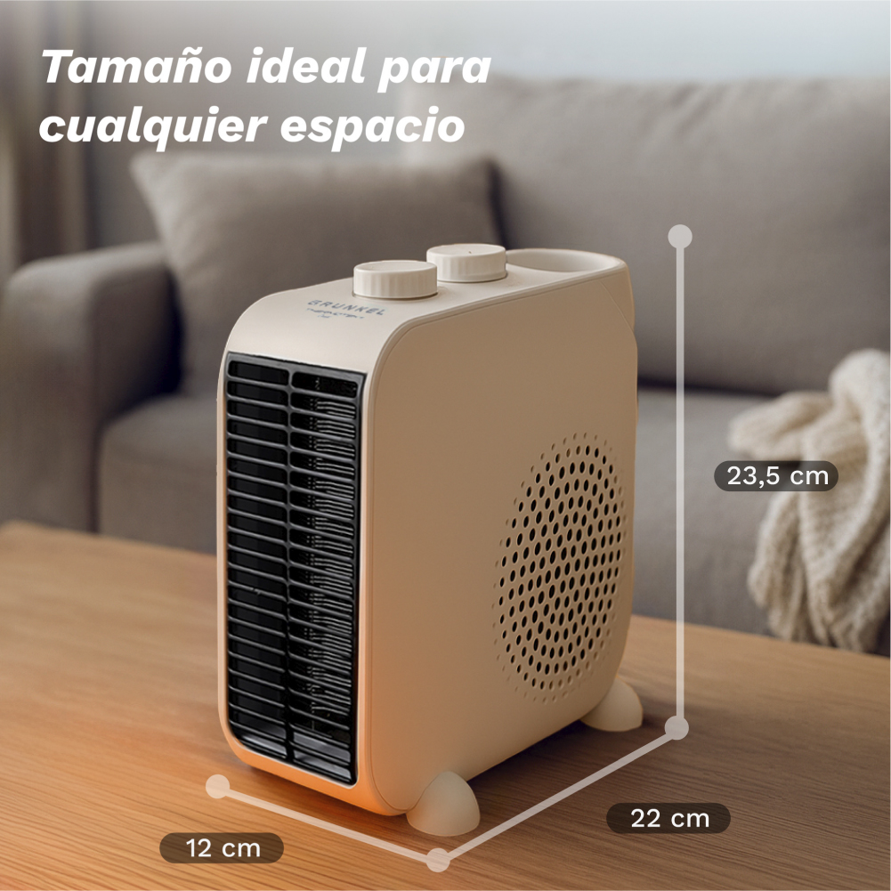 Un calefactor eléctrico beige sobre una mesa de madera. Se indican las dimensiones: 12 cm, 22 cm y 23,5 cm. Un sofá en el fondo.
