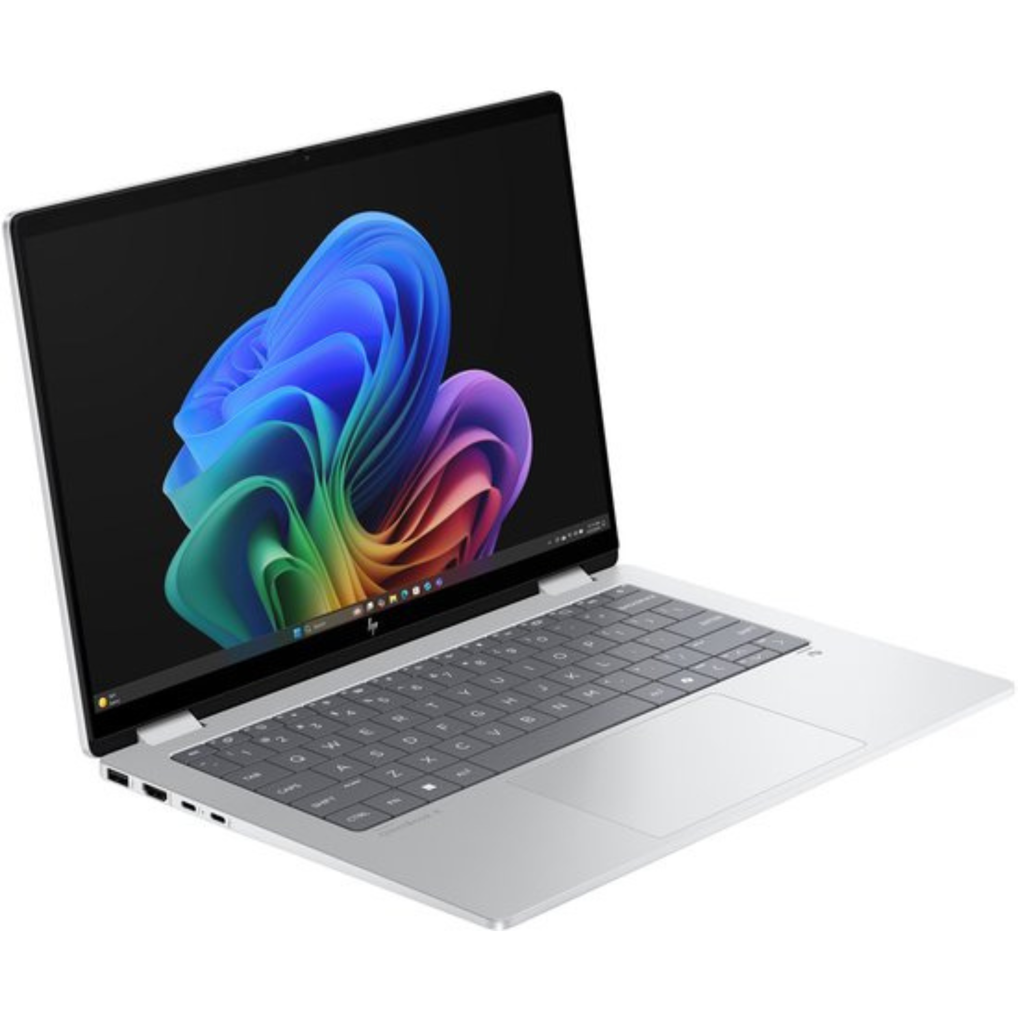 Zilveren laptop met open scherm, met een kleurrijke abstracte afbeelding. Toetsenbord is zichtbaar. De laptop staat op een wit oppervlak.