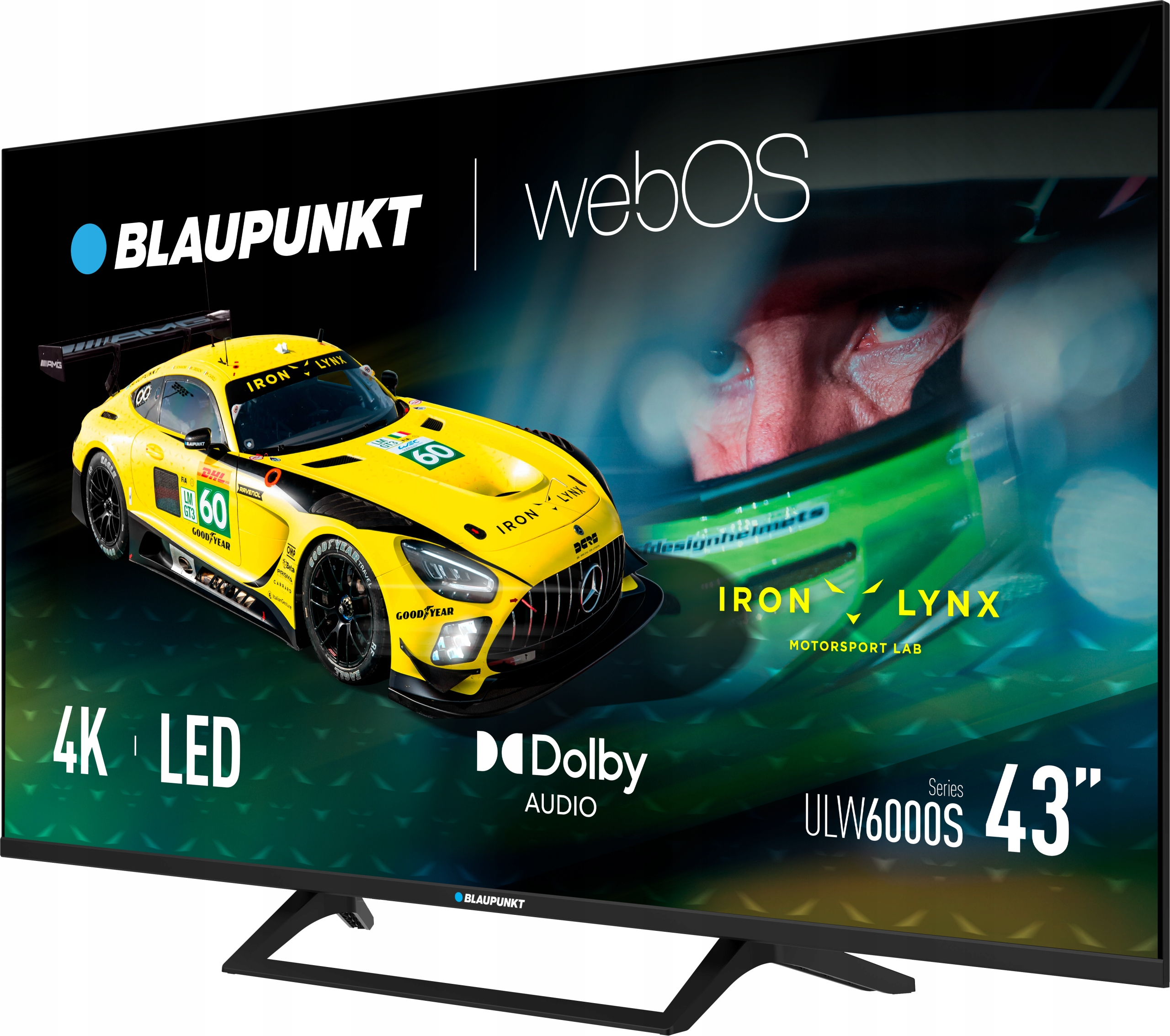 Schermo TV con un'auto da corsa gialla, nomi di marchi e specifiche. È un televisore 4K LED Dolby Audio da 43 pollici.